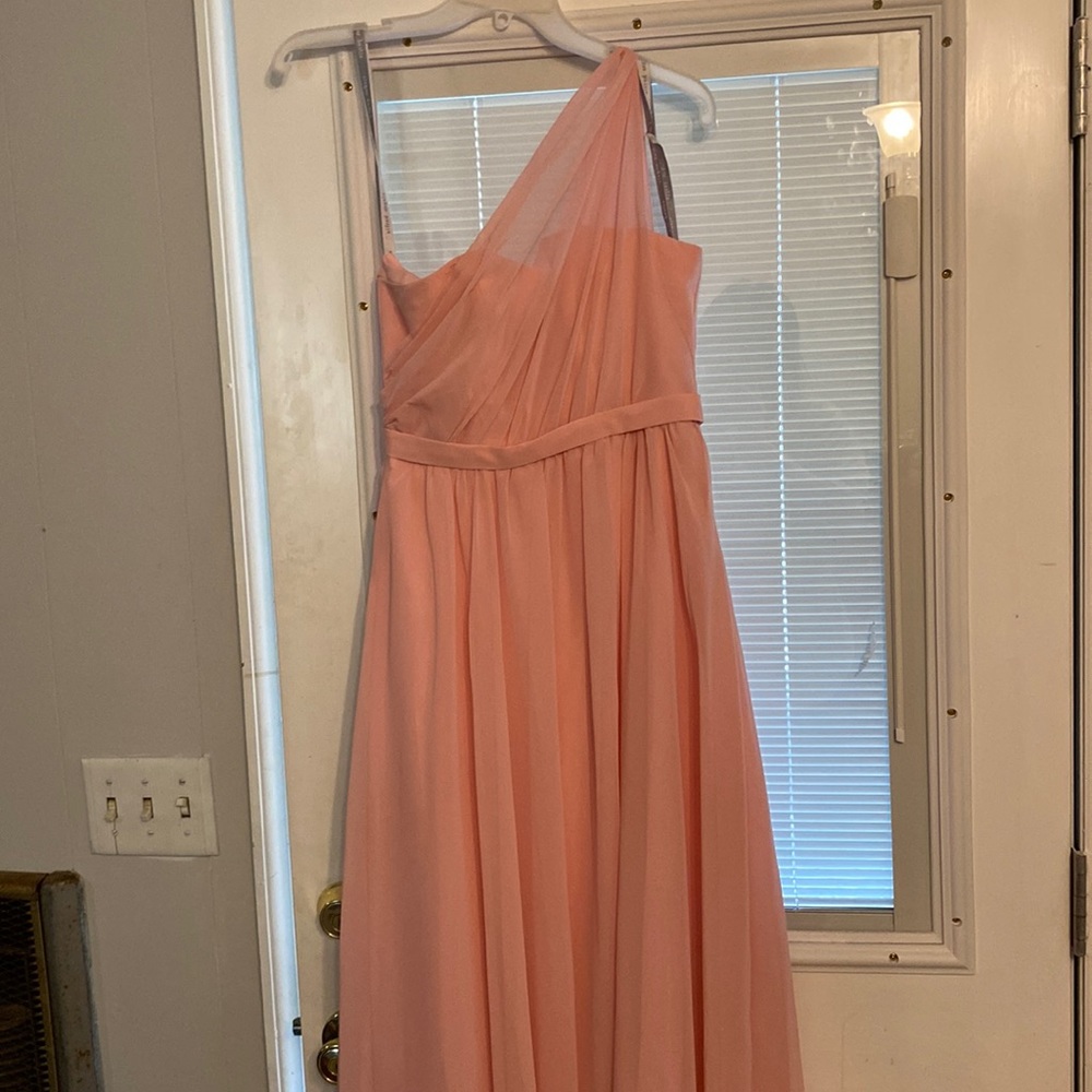 Floor length one shoulder dress.